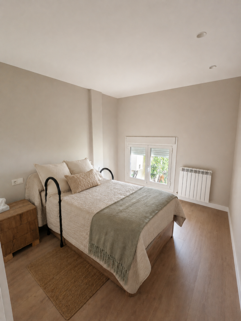 Reforma integral en Fustiñana, Navarra de espacio auxiliar a dormitorio con baño adaptado-Sikora Reformas Integrales en Pamplona
